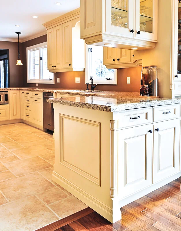 Hardwood to tile transition in traditional kitchen